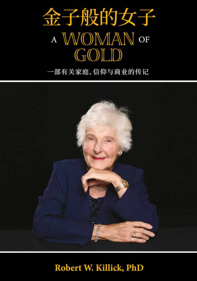 A smiling older woman in formal attire, showcasing the book title "A Woman of Gold" with a black background.